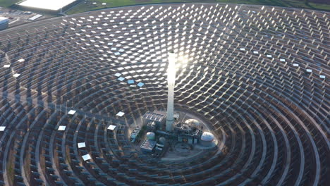 Sun-reflecting-on-giant-mirrors-concentrated-solar-power-Gemasolar-Spain-aerial